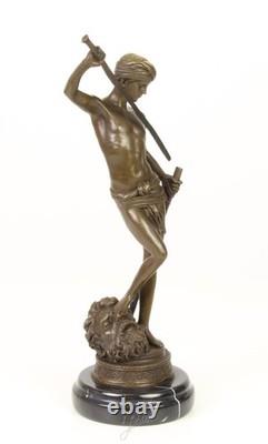 Bronze sculpture of David on a black marble base after Antonin Mercier