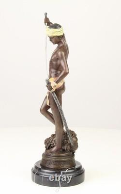 Bronze sculpture of David on a black marble pedestal after Antonin Mercier