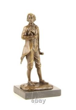 Bronze sculpture of Frédéric Chopin on a black marble pedestal after Milo