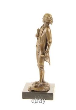 Bronze sculpture of Frédéric Chopin on a black marble pedestal after Milo