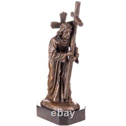 Bronze sculpture of Jesus with cross on black marble after Valli