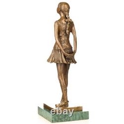 Bronze sculpture of a 14-year-old little dancer on green marble after Degas