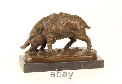 Bronze sculpture of a Wild Boar on a black marble, signed