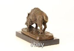 Bronze sculpture of a Wild Boar on a black marble, signed