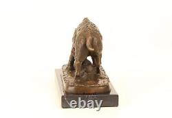 Bronze sculpture of a Wild Boar on a black marble, signed