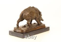 Bronze sculpture of a Wild Boar on a black marble, signed