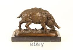 Bronze sculpture of a Wild Boar on a black marble, signed