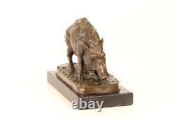 Bronze sculpture of a Wild Boar on a black marble, signed