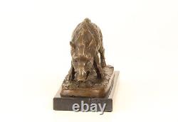 Bronze sculpture of a Wild Boar on a black marble, signed