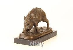 Bronze sculpture of a Wild Boar on a black marble, signed