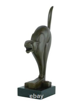 Bronze sculpture of a cat on a marble base after Chris van der Hoef