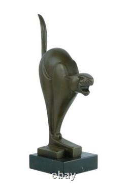 Bronze sculpture of a cat on a marble base after Chris van der Hoef