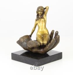 Bronze sculpture of a hand holding a woman on a marble base after Juno