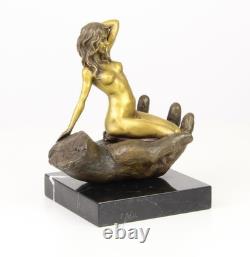 Bronze sculpture of a hand holding a woman on a marble base after Juno