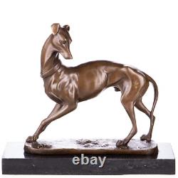 Bronze sculpture of a hunting dog / greyhound on a black marble base after Barye