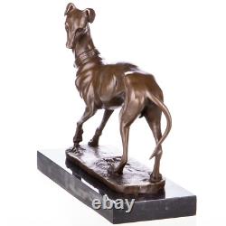 Bronze sculpture of a hunting dog / greyhound on a black marble base after Barye