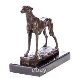 Bronze sculpture of a hunting dog / greyhound on a black marble base after Barye