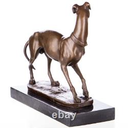 Bronze sculpture of a hunting dog / greyhound on a black marble base after Barye
