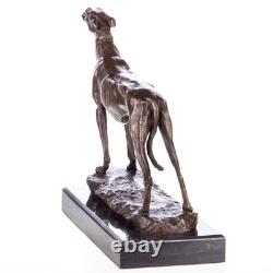 Bronze sculpture of a hunting dog / greyhound on a black marble base after Barye