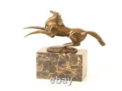 Bronze sculpture of a modern harnessed horse on a marble base, signed