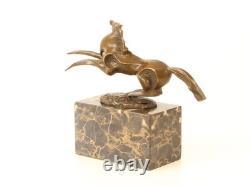 Bronze sculpture of a modern harnessed horse on a marble base, signed