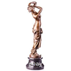 Bronze sculpture of a nude woman on black marble Signed