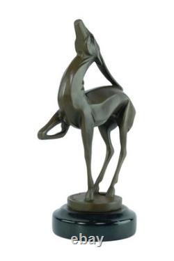 Bronze sculpture of an antelope on black marble after Marcel Bouraine