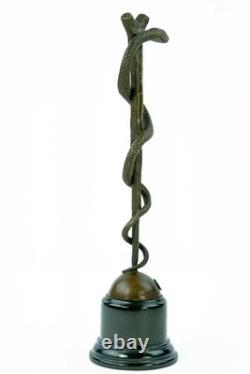 Bronze sculpture of the caduceus of Asclepius on a marble base after Cadueus