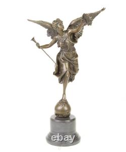 Bronze sculpture of the winged victory on a marble base signed