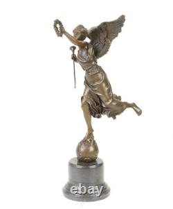 Bronze sculpture of the winged victory on a marble base signed