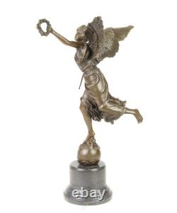 Bronze sculpture of the winged victory on a marble base signed