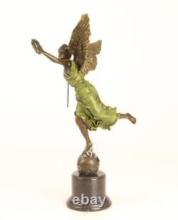 Bronze sculpture of the winged victory on a marble base, signed