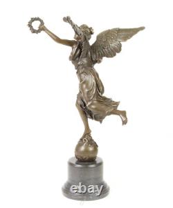 Bronze sculpture of the winged victory on a marble base signed
