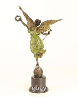 Bronze sculpture of the winged victory on a marble base, signed