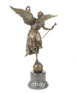 Bronze sculpture of the winged victory on a marble base signed