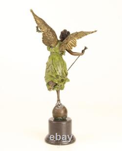 Bronze sculpture of the winged victory on a marble base, signed