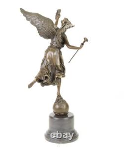 Bronze sculpture of the winged victory on a marble base signed