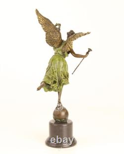 Bronze sculpture of the winged victory on a marble base, signed
