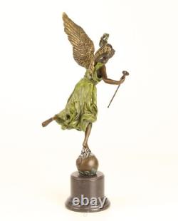 Bronze sculpture of the winged victory on a marble base, signed