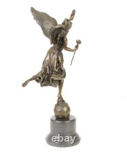 Bronze sculpture of the winged victory on a marble base signed