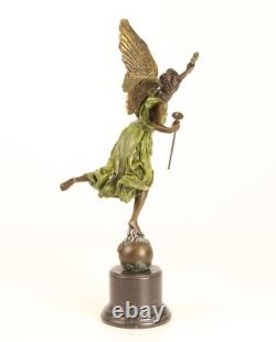 Bronze sculpture of the winged victory on a marble base, signed