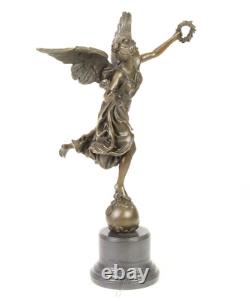 Bronze sculpture of the winged victory on a marble base signed