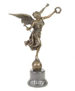 Bronze sculpture of the winged victory on a marble base signed