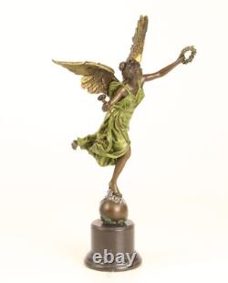 Bronze sculpture of the winged victory on a marble base, signed