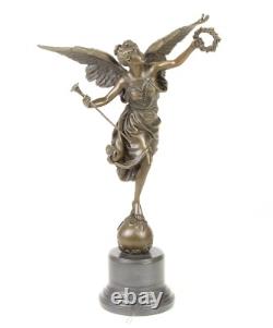 Bronze sculpture of the winged victory on a marble base signed
