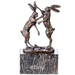 Bronze sculpture of two fighting hares on a vintage marble after Nick