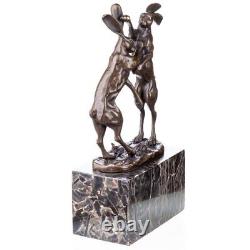 Bronze sculpture of two fighting hares on a vintage marble after Nick