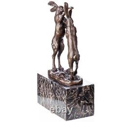 Bronze sculpture of two fighting hares on a vintage marble after Nick