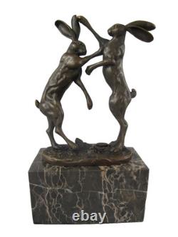 Bronze sculpture of two rabbits in combat on a marble base after Nick