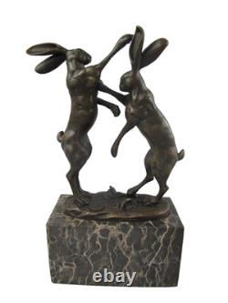 Bronze sculpture of two rabbits in combat on a marble base after Nick